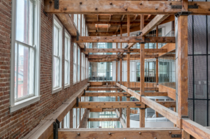 coworking trends 2026 cac interior 3rd floor with wooden beams and natural light